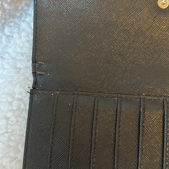 DKNY Wallet in good condition. Please see all photos. Damage on inside flap. - Picture 6 of 7